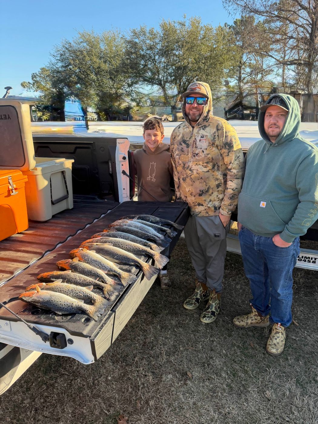 Guests with a speckled trout catch