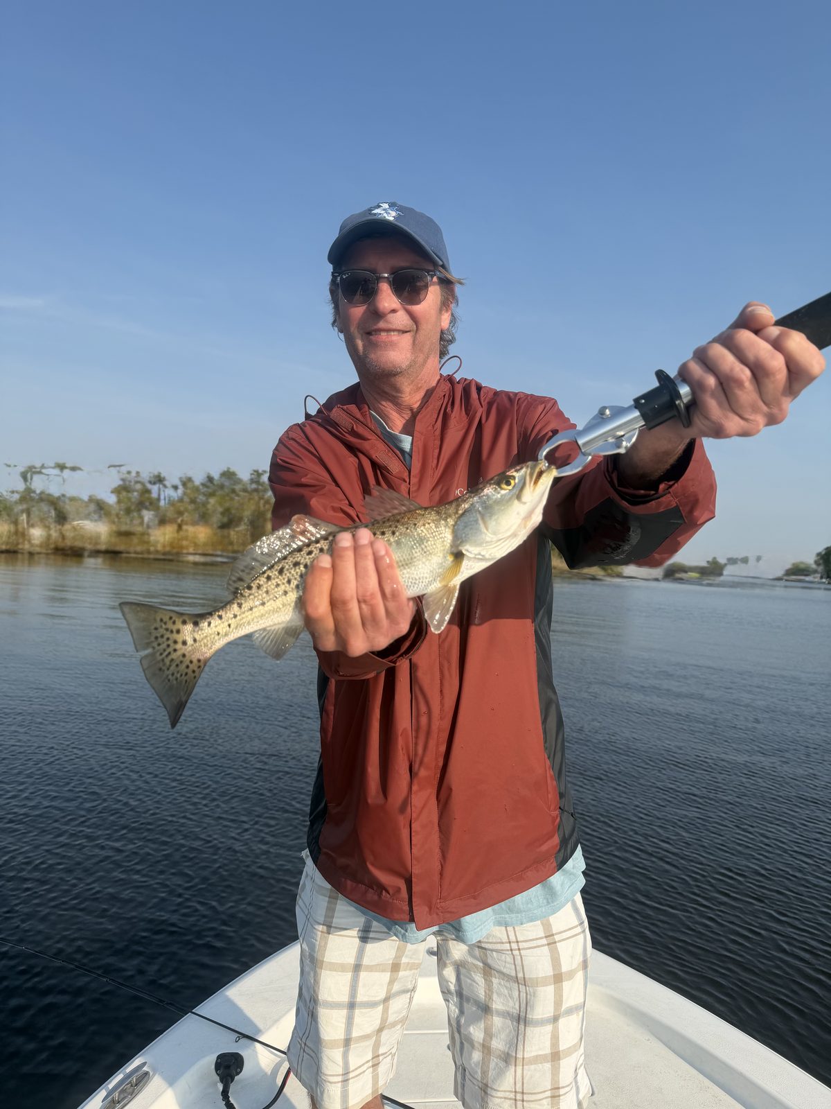 Angler with a personal-best trout